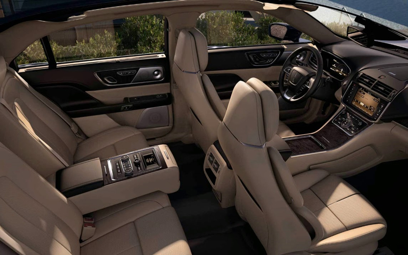 Luxury car interior with beige leather seats